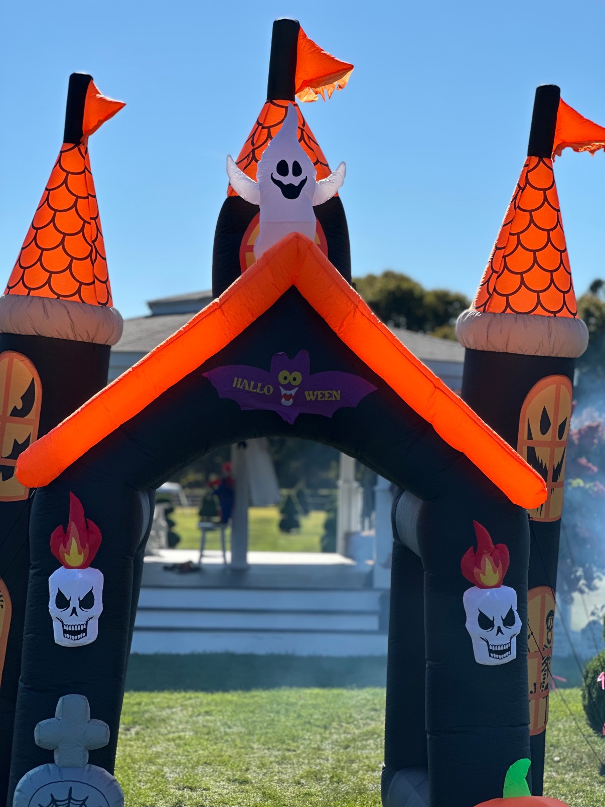 The inflatable Halloween castle archway framing the gazebo
