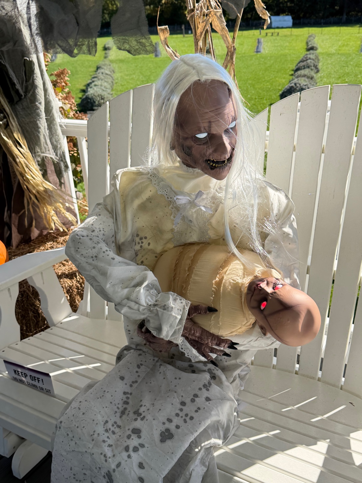 One of the haunted gazebo's creepier residents, baby in arms