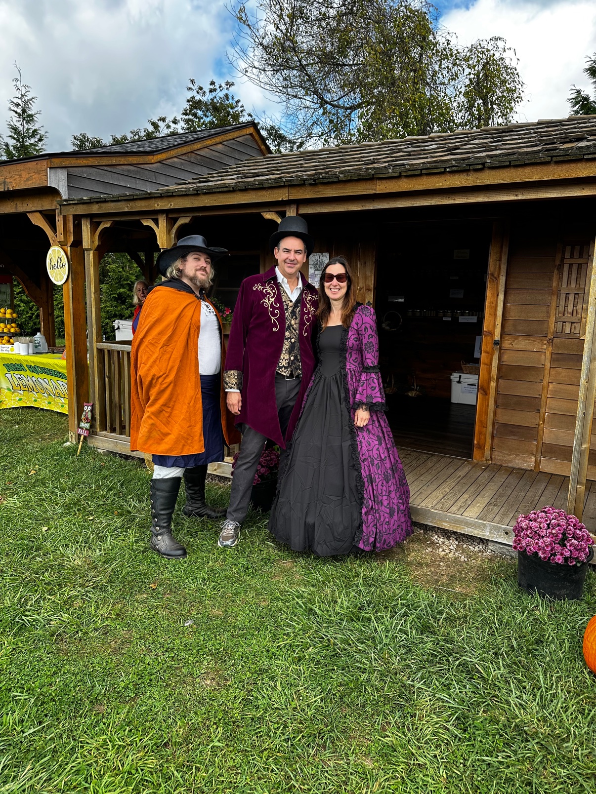 In costume in front of the farm shop